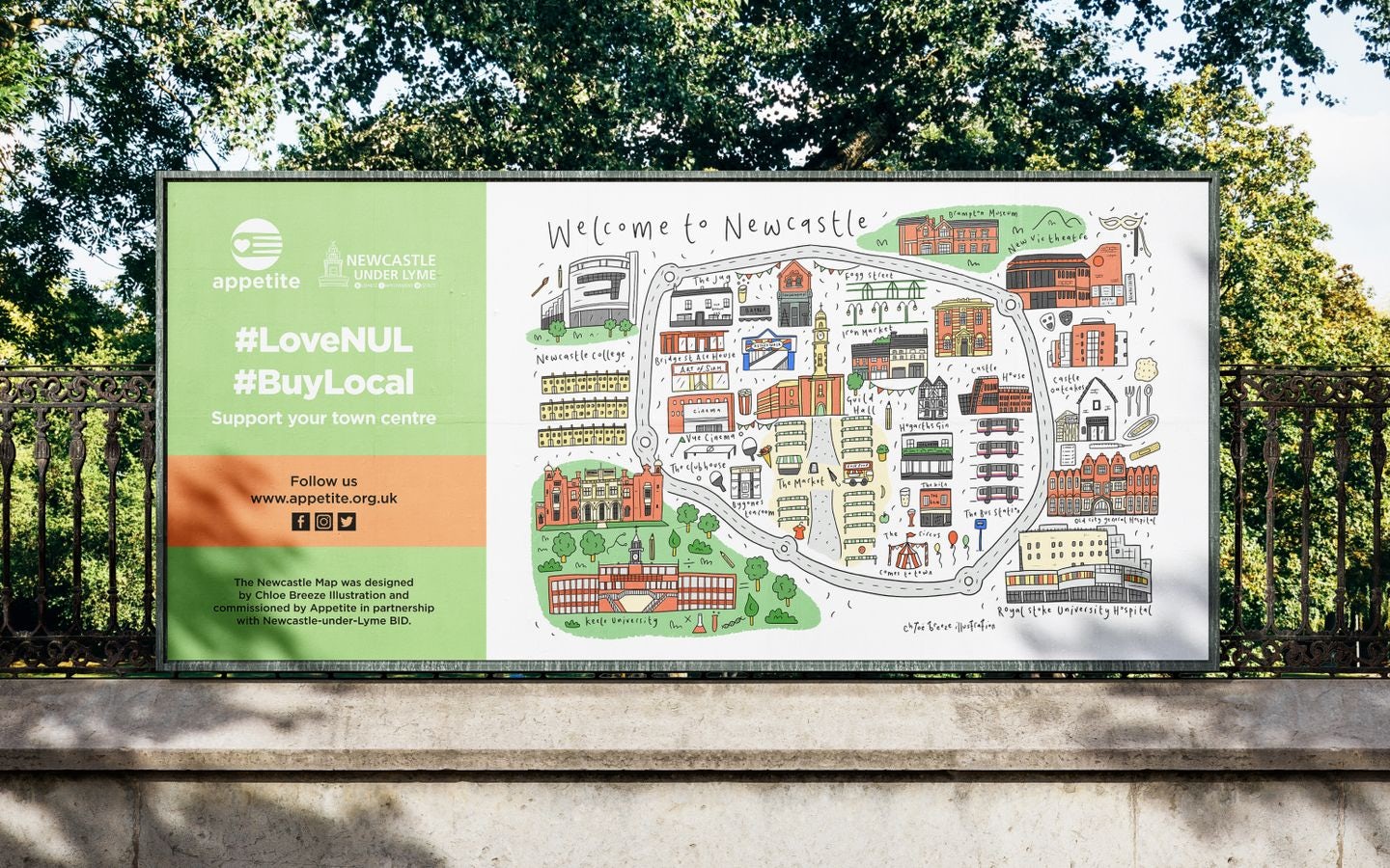 Appetite advertisement on a billboard showing a 'Welcome to Newcastle' illustrated map with #LoveNUL and #BuyLocal, displayed on a metal fence in a public area.